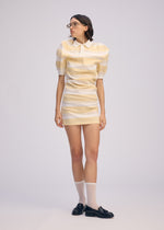 A model wears the ISSEY MIYAKE GENERIC WEAR STRIPES shirt.