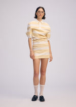 A model wears the ISSEY MIYAKE GENERIC WEAR STRIPES shirt.