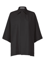 A product shot of the ISSEY MIYAKE LOOPED shirt in black (15).