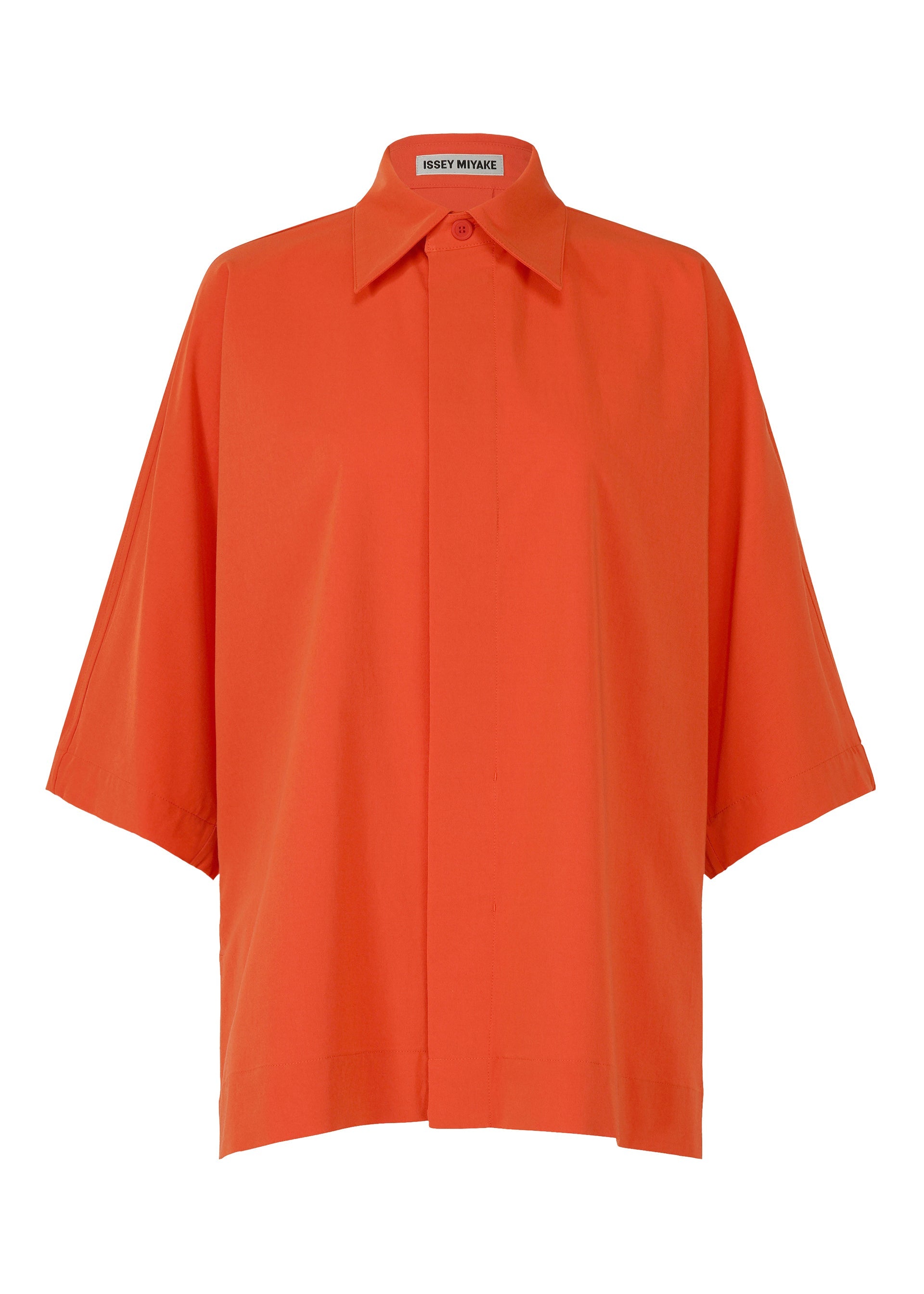 A product shot of the ISSEY MIYAKE LOOPED shirt in macaw red (28).