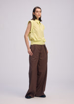 A model wears the ISSEY MIYAKE ODD SHIRT 2 shirt.