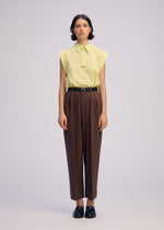 A model wears the ISSEY MIYAKE ODD SHIRT 2 shirt.