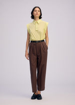 A model wears the ISSEY MIYAKE ODD SHIRT 2 shirt.