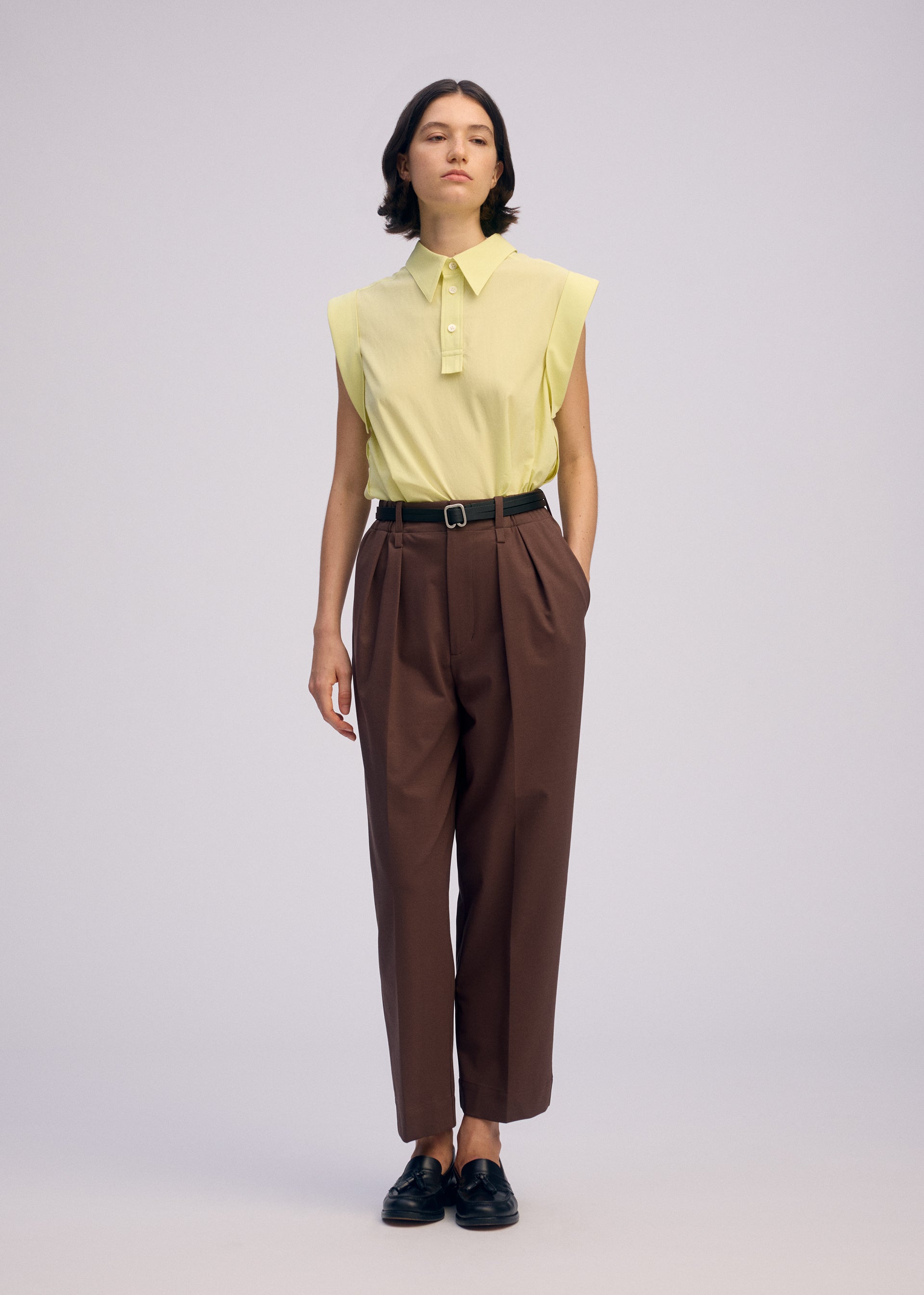 A model wears the ISSEY MIYAKE ODD SHIRT 2 shirt.