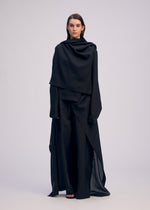 A model wears the ISSEY MIYAKE ALL SQUARES top.