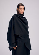 A model wears the ISSEY MIYAKE ALL SQUARES top.
