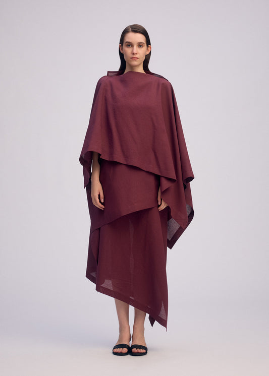 A model wears the ISSEY MIYAKE ALL SQUARES top.