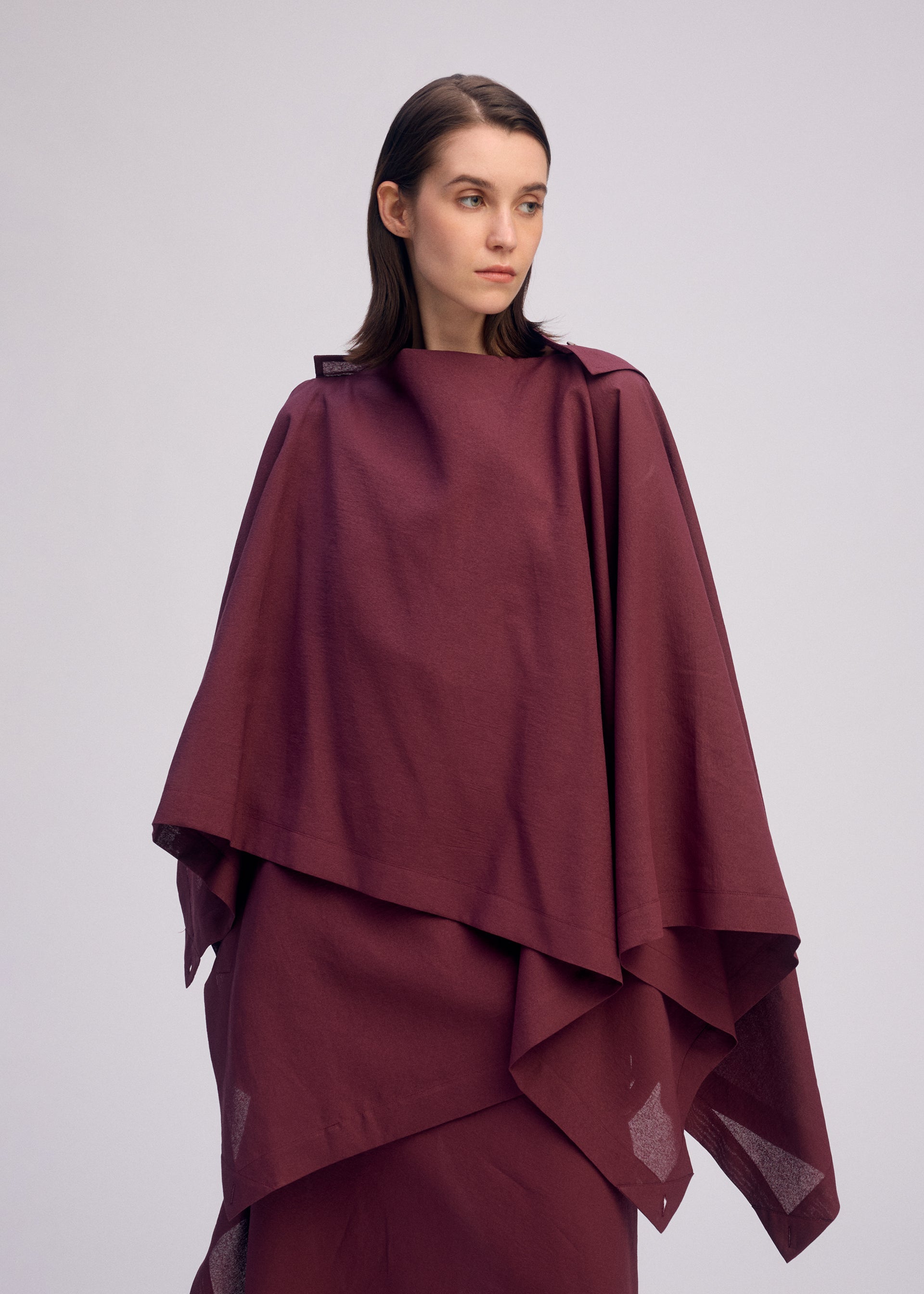 A model wears the ISSEY MIYAKE ALL SQUARES top.
