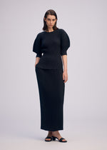 A model wears the ISSEY MIYAKE SLEEK PLEATS sleek-pleats-shirt-black-1.