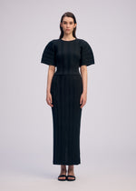A model wears the ISSEY MIYAKE LINEN LIKE RIB PLEATS shirt.