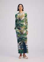 A model wears the ISSEY MIYAKE URBAN JUNGLE JERSEY skirt.
