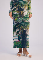 A model wears the ISSEY MIYAKE URBAN JUNGLE JERSEY skirt.