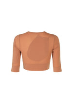 A detail shot of the ISSEY MIYAKE A SHOPPER'S BODY clothing.