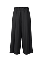 A product shot of the ISSEY MIYAKE CAMPAGNE trousers in black (15).