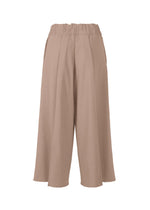 A detail shot of the ISSEY MIYAKE CAMPAGNE trousers.