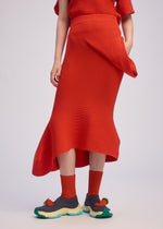 A model wears the ISSEY MIYAKE LIFE FORM skirt.