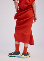 A model wears the ISSEY MIYAKE LIFE FORM skirt.