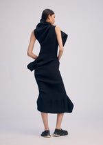 A model wears the ISSEY MIYAKE LIFE FORM dress.