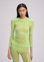 A model wears the ISSEY MIYAKE SLITS MESH AP top.