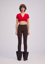A model wears the ISSEY MIYAKE ELEPHANT KNIT clothing.
