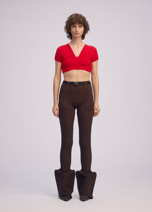 A model wears the ISSEY MIYAKE ELEPHANT KNIT clothing.
