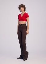 A model wears the ISSEY MIYAKE ELEPHANT KNIT clothing.