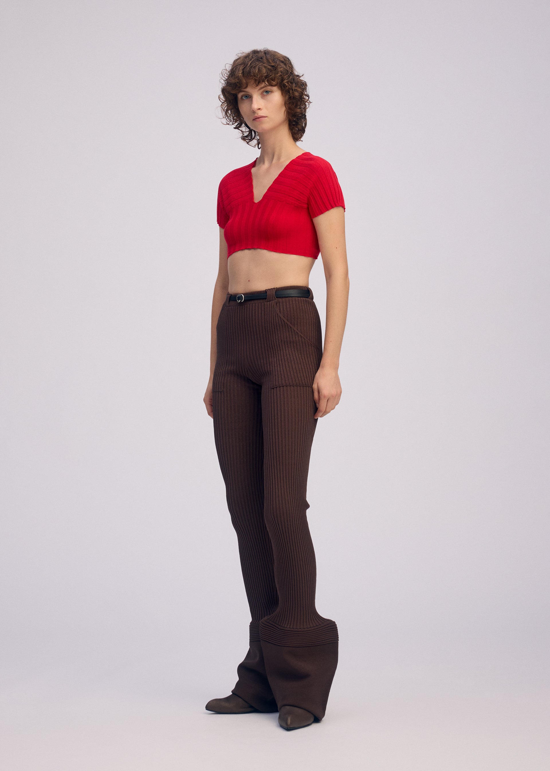 A model wears the ISSEY MIYAKE ELEPHANT KNIT clothing.