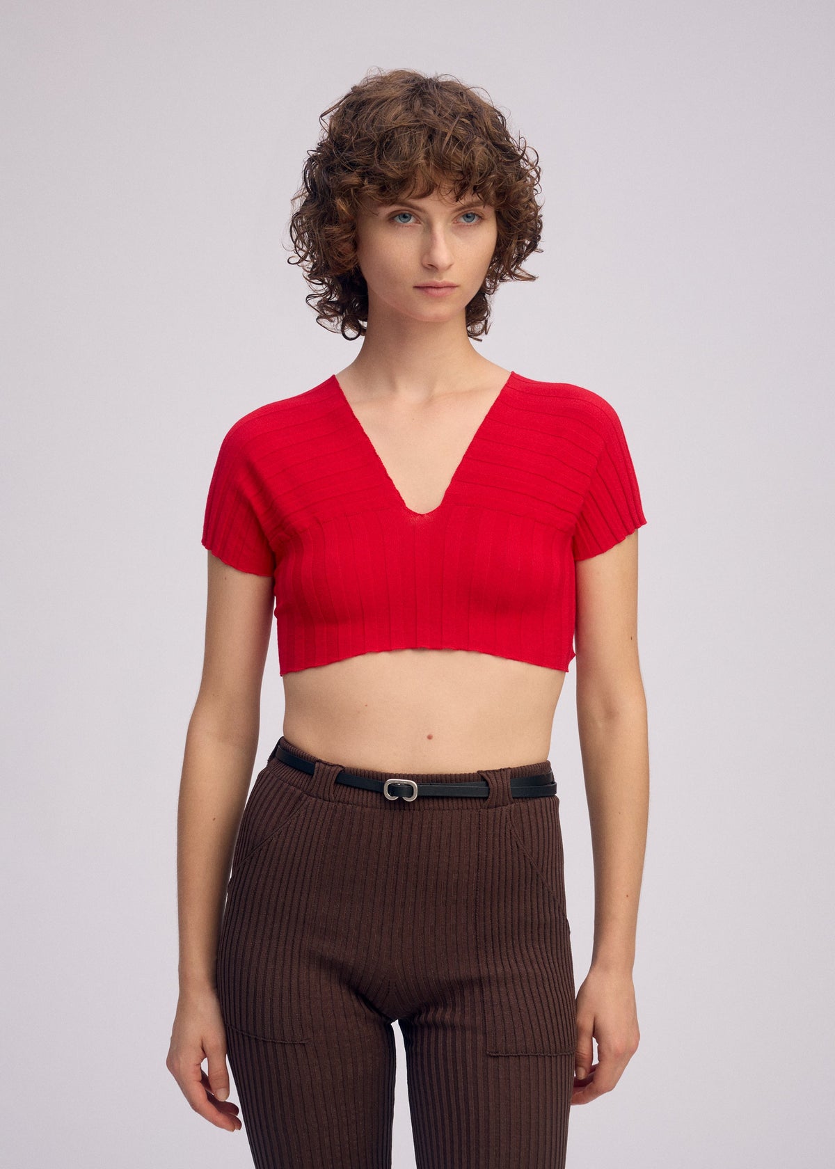 A model wears the ISSEY MIYAKE ELEPHANT KNIT clothing.