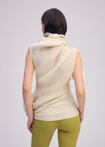 A model wears the ISSEY MIYAKE LIFE FORM dress.