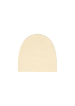 A product shot of the ISSEY MIYAKE O KNIT BEANIE cap in off-white.