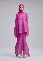 A model wears the ISSEY MIYAKE PANINI BALACLAVA panini-balaclava-cap-light-beige.