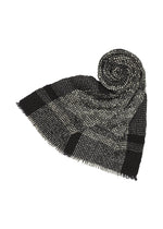 A product shot of the ISSEY MIYAKE BUMPY WOOL STOLE stole in black-hued.