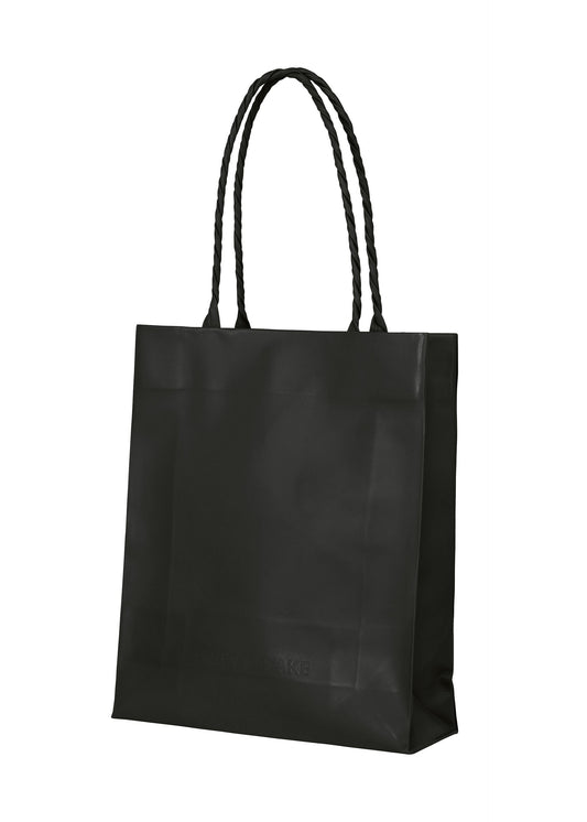 A product shot of the ISSEY MIYAKE PAPER BAG(LEATHER) shoulder bag in black.