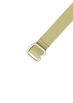A detail shot of the ISSEY MIYAKE SOLID LEATHER BELT belt.