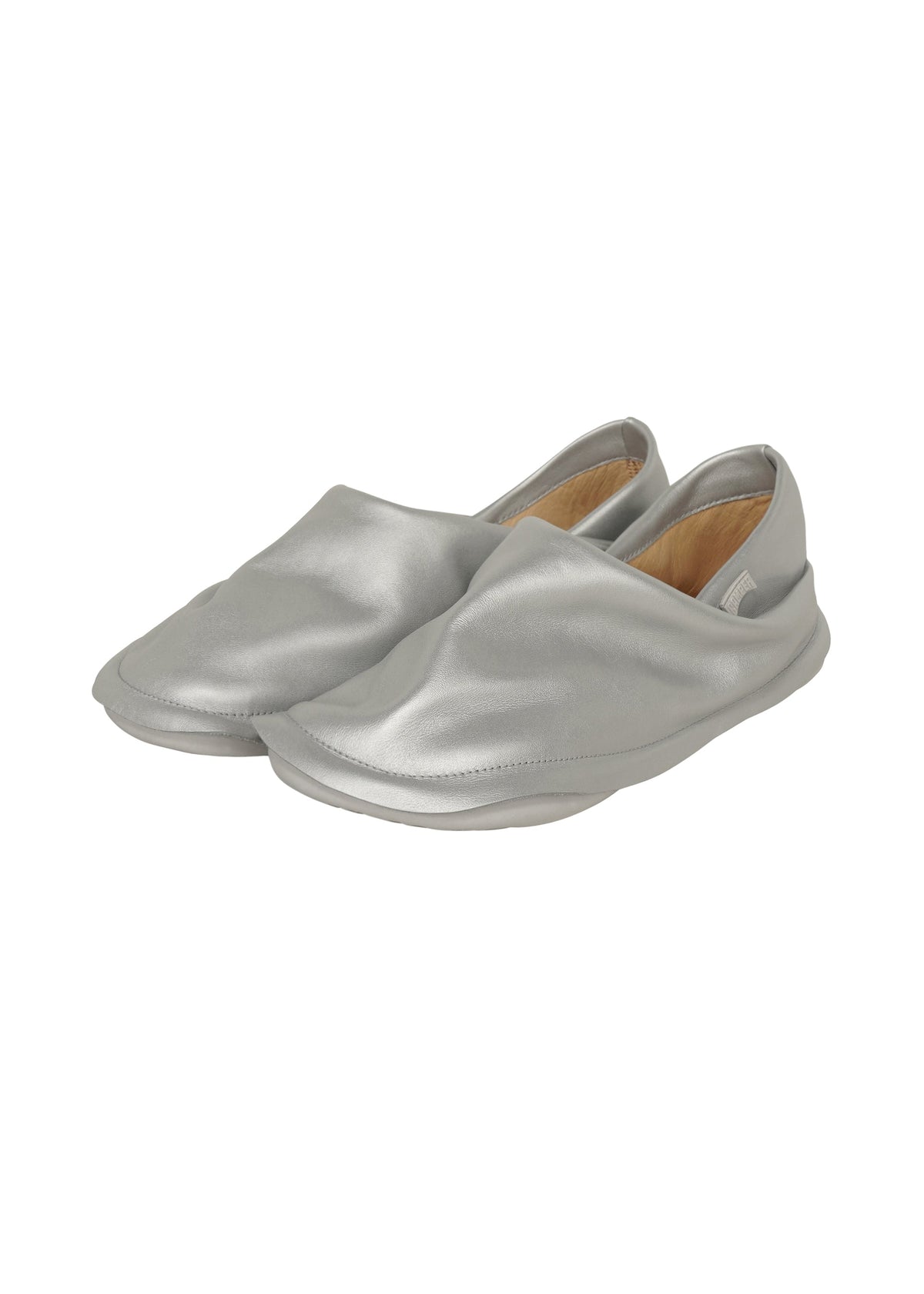 A product shot of the ISSEY MIYAKE PEU FORM shoes in silver.