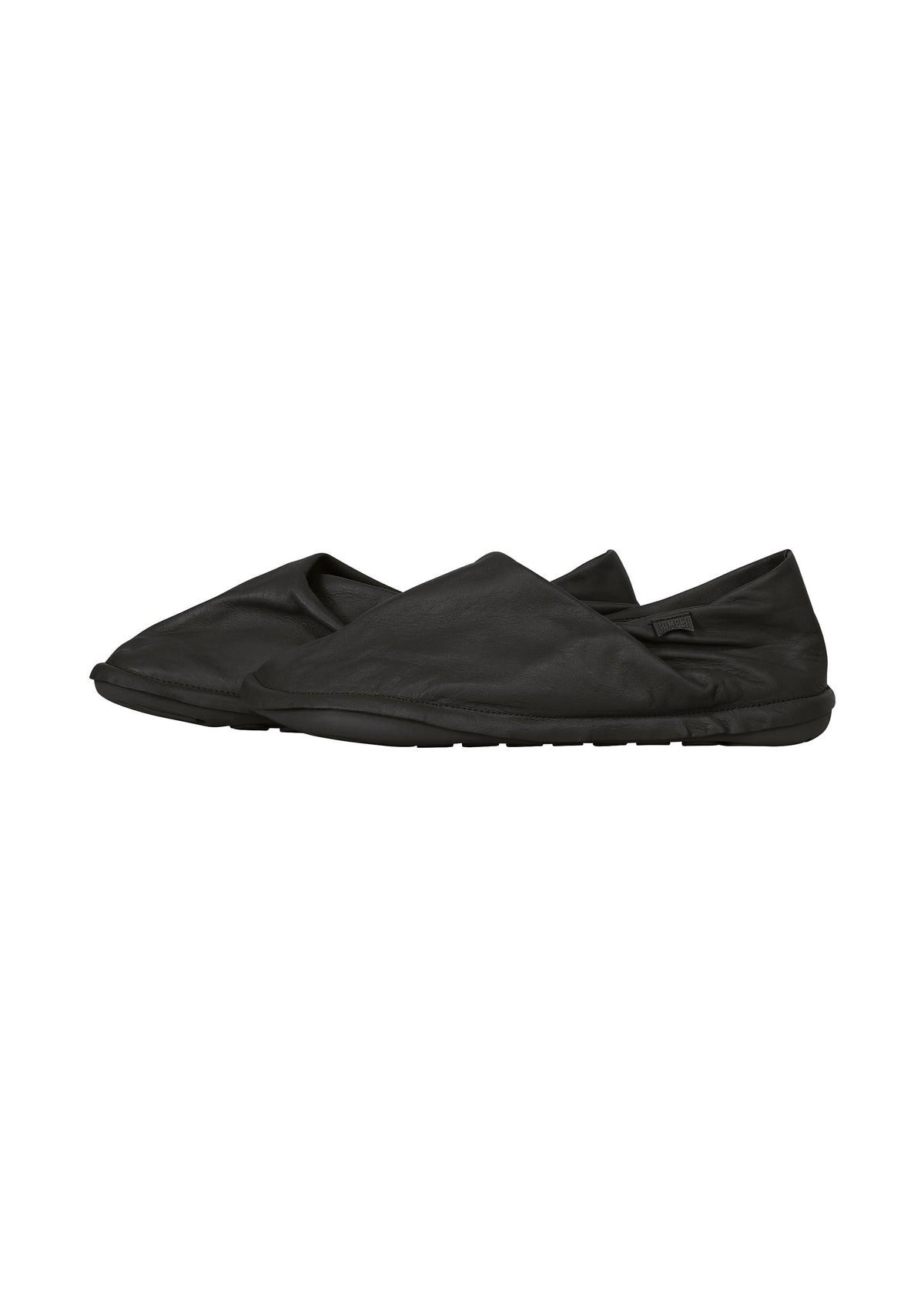 A detail shot of the ISSEY MIYAKE PEU FORM shoes.