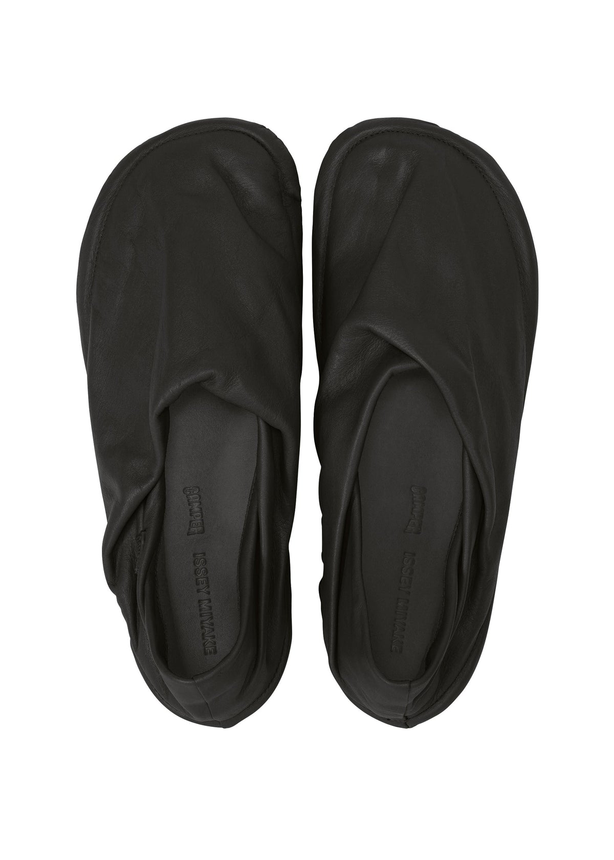 A detail shot of the ISSEY MIYAKE PEU FORM shoes.