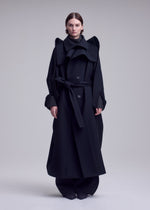 A model wears the ISSEY MIYAKE CALLIGRAPH calligraph-coat-purple.