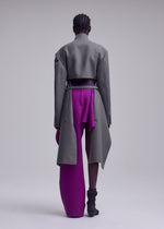 A model wears the ISSEY MIYAKE CALLIGRAPH calligraph-jacket-grey.