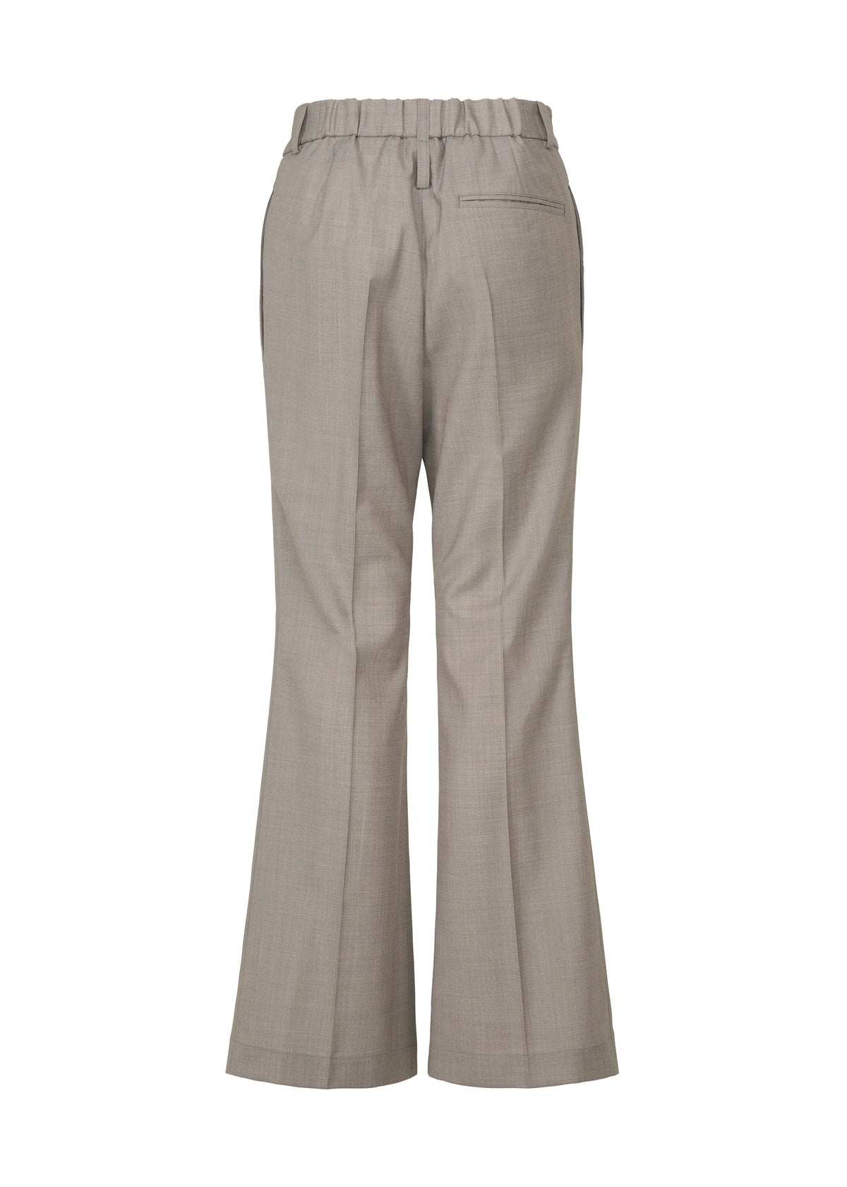 A detail shot of the ISSEY MIYAKE HONEST ENSEMBLE trousers.