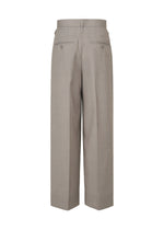 A detail shot of the ISSEY MIYAKE HONEST ENSEMBLE trousers.