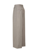 A detail shot of the ISSEY MIYAKE HONEST ENSEMBLE trousers.