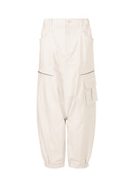 A product shot of the ISSEY MIYAKE GRAINY PANTS trousers in off-white.