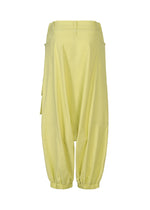 A detail shot of the ISSEY MIYAKE GRAINY PANTS trousers.