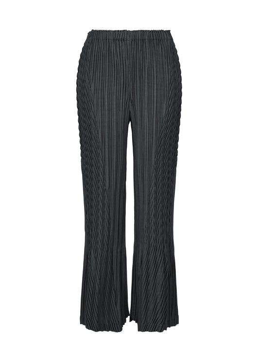 A product shot of the ISSEY MIYAKE UNFURLING PLEATS trousers in dark navy.