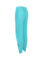 A detail shot of the ISSEY MIYAKE LEAF PLEATS trousers.