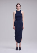 A model wears the ISSEY MIYAKE LEAF PLEATS leaf-pleats-skirt-light-blue.