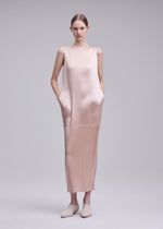 A model wears the ISSEY MIYAKE GLOSSED PANELS PLEATS glossed-panels-pleats-dress-grey.