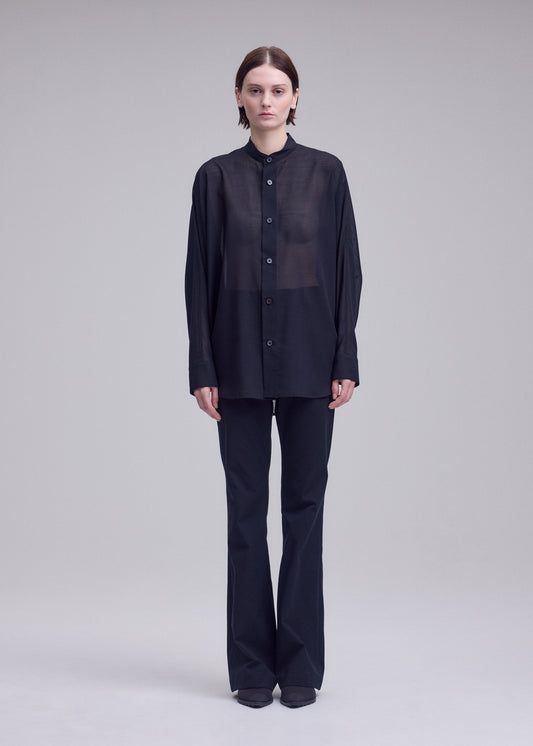 A model wears the ISSEY MIYAKE SHEER WOOL shirt.
