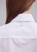A model wears the ISSEY MIYAKE MONSIEUR SHIRT monsieur-shirt-shirt-black.
